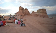 Hikers Waiting at Delicate Arch